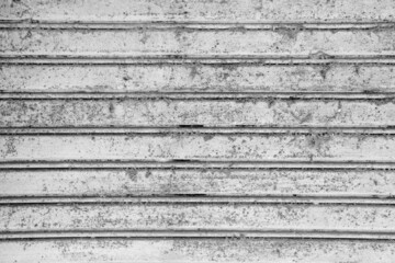 Store front metal iron curtain texture background. Roll up metal blinds background.