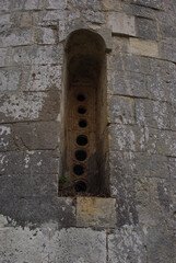 Capestrano - Abruzzo - Abbey of San Pietro ad Oratorium - Small window of the external apses