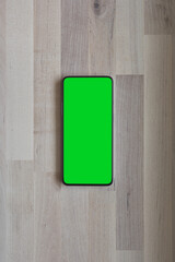 Mobile phone tablet with round edges, with blank green screen