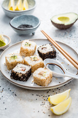Tuna and avocado sushi wrapped in sesame seeds