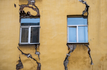 Cracks on the facade of a residential building