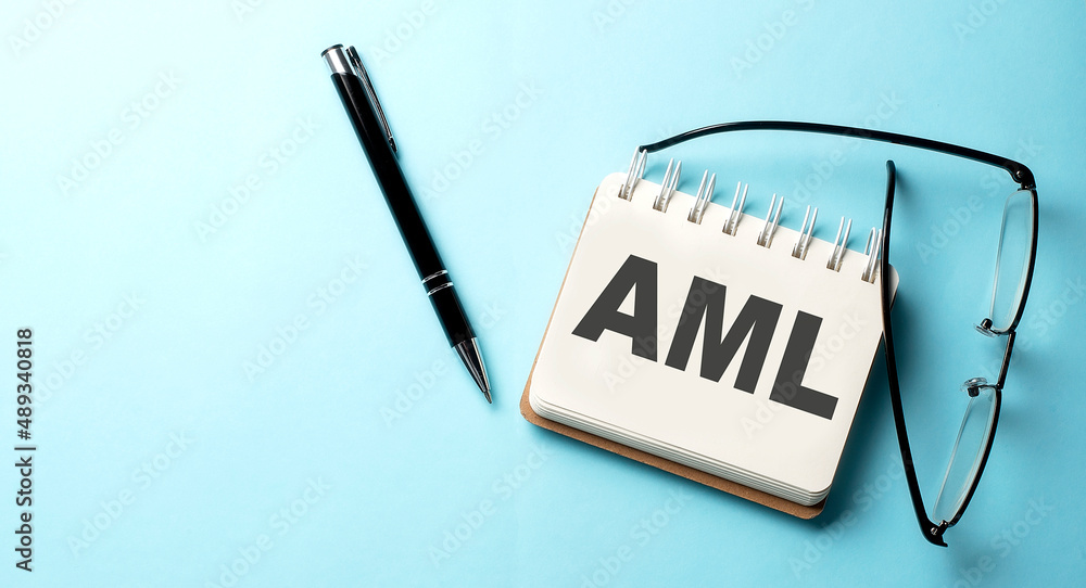 Poster aml text written on a notepad on the blue background