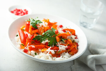 Rice with roasted bell pepper and pomegranate