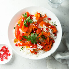 Rice with roasted bell pepper and pomegranate