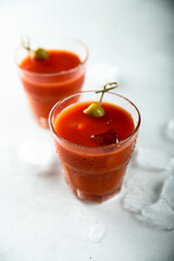 Traditional Bloody Mary cocktail with olive