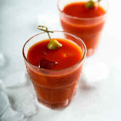 Traditional Bloody Mary cocktail with olive