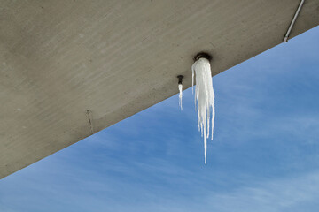 icicles hanging from the highway underpass ceiling