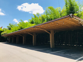 The roof of the parking lot in Thailand is made of bamboo trunks.