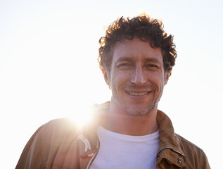 Is it me youre looking for. A cropped portrait of a handsome man standing outdoors.