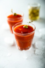 Traditional Bloody Mary cocktail with olive
