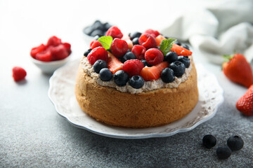 Homemade berry cake with cream filling