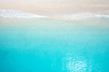 Aerial top down view at Beautiful coast with crystal blue water