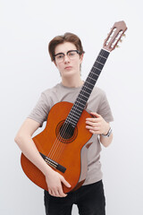 teen boy with guitar
