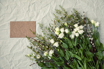 Flower arrangment on crumpled paper.