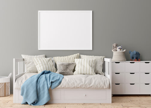 Empty horizontal picture frame on gray wall in modern child room. Mock up interior in scandinavian style. Free, copy space for your picture. Bed, console, toys. Cozy room for kids. 3D rendering.