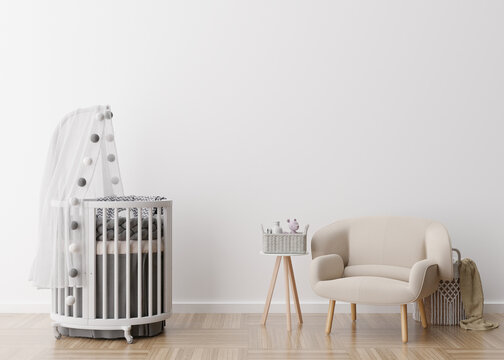Empty white wall in modern child room. Mock up interior in scandinavian style. Free, copy space for your picture, poster. Baby bed, armchair. Cozy room for kids. 3D rendering.