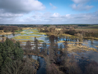 The Grabia river with high water level in central Poland. 