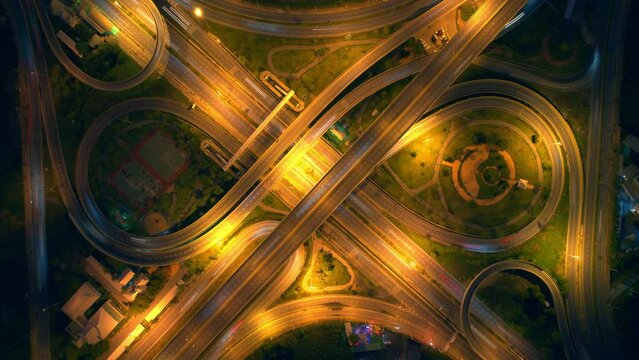 4K : Aerial time lapse in motion drone shot of freeway and interstate traffic. cars and light streaks. hyperlapse traffic
