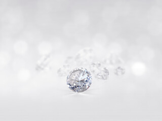 still with expensive cut diamonds in front of a white background, reflections on the ground. Lot of...