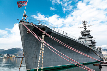 Warship cruiser at the berth in the seaport