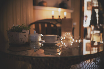 romantic wooden coffee table. Restaurant interior and holiday home decor concept. Toned picture