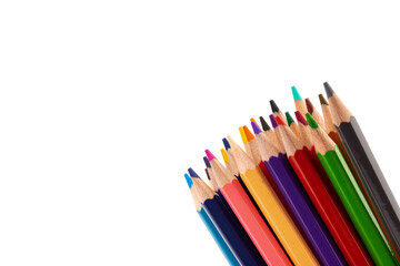Many multicolored pencils, isolated on white background with copy space. Art and education background.