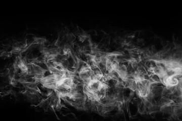 Smoke over black background. Fog or steam texture.