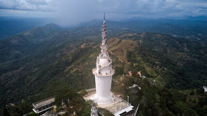 Aerial view of Ambuluwawa tower in central Sri Lanka. Tower near the town of Gampola  - obrazy, fototapety, plakaty