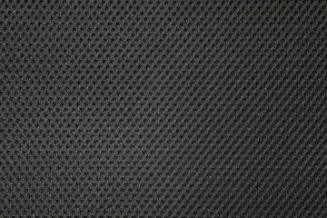 black gray fishnet cloth nylon material as a texture background
