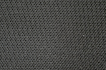 Close up black gray fishnet cloth nylon material as a texture background