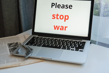 the inscription on the laptop monitor screen "say no to war"