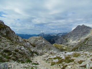High alpine rocky landscape at Kriski podi in Julian alps and Triglav national park, Slovenia with...