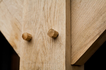 Traditional joinery in wooden architecture -  skilled carpenter work -  connected beam and post in...