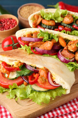 Concept of tasty food with pitas with chicken meat
