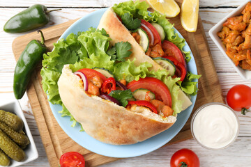Concept of tasty food with pitas with chicken meat