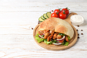 Concept of tasty food with pita with chicken meat