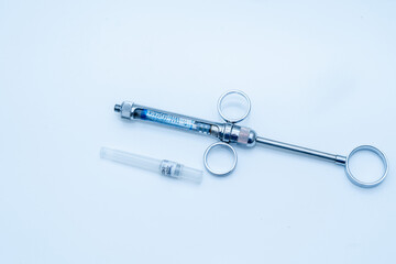 Dental syringe on table in dental office