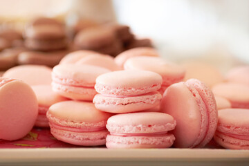 Freshly baked biscuits. Cropped shot of a fresh batch of pink macaroons.