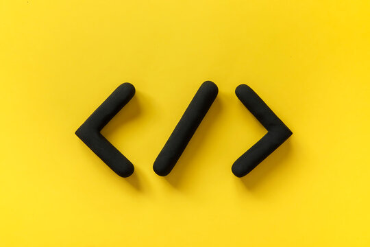 Coding language development icon on yellow background. Software development concept. Programming code browser symbol, 3d sign website coding.