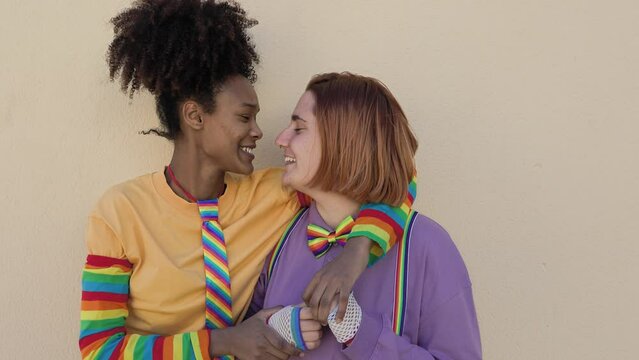 Happy women gay couple having tender moments outdoor - Lgbt and love relationship concept