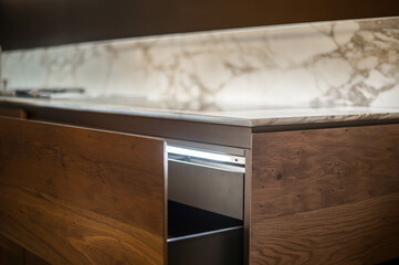 detail of airy subtile kitchen with ragged edge and marble work top