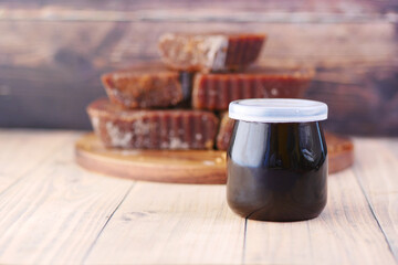 stack of Jaggery traditional cane sugar cube on table 