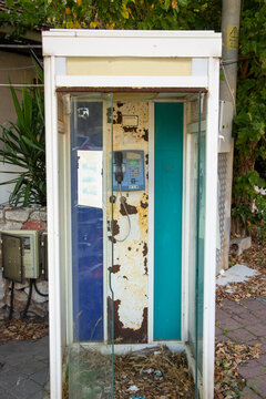 old and rusty telephone booth