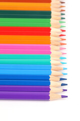 A close-up of colorful crayons isolated on a white background
