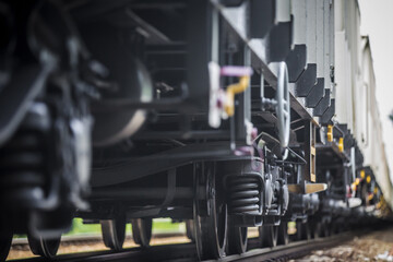 Close-up on a Train Car Undercarriage, passenger train, freight train