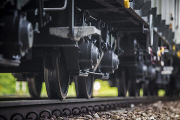 Close-up on a Train Car Undercarriage, passenger train, freight train