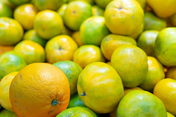 Orange in the super market selling a variety of fresh food.