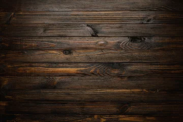 Rolgordijnen Donker gebeitst houten tafel achtergrond, rustieke houten planken textuur bovenaanzicht. © nevodka.com