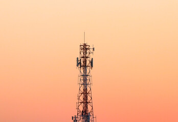 Transmission tower with sunset in the evening, wide of sunset view