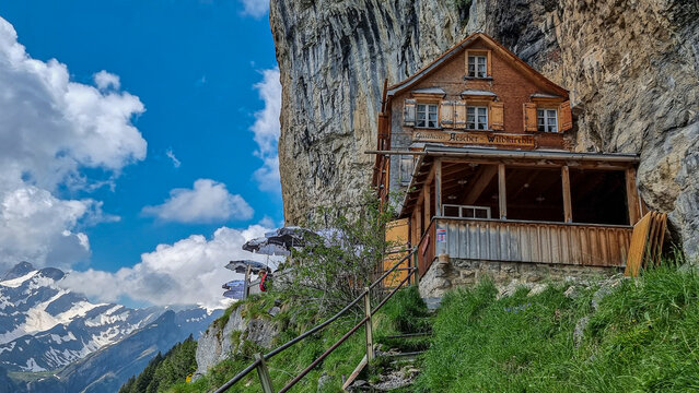 Low angle shot of Ebenalp with its famous cliff inn Aescher, Switzerland